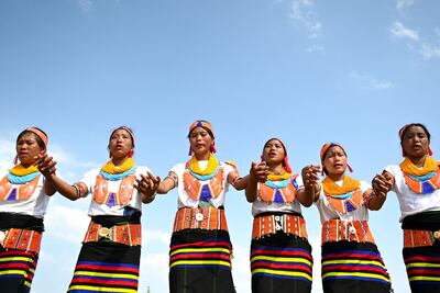 The Konyak tribeswomen dance at their community gathering in Longwa village in the Mon district of India's Nagaland state. AFP
