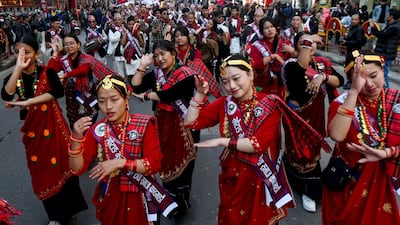Members of the Gurung community wearing traditional attire dance on the occasion of Tamu Lhosar festival marking the commencement of Gurung New Year in Kathmandu. AFP