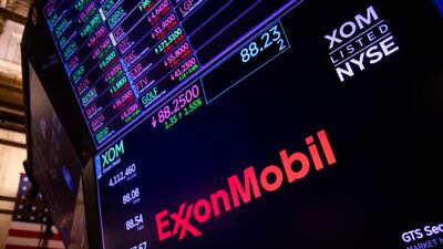 Exxon Mobil Corp signage on the floor of the New York Stock Exchange. Bloomberg