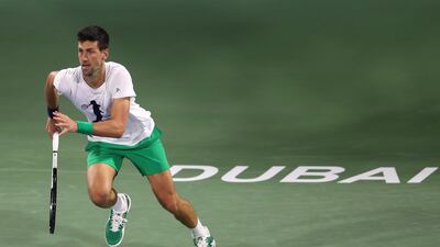Novak Djokovic trains in Dubai on Sunday. EPA