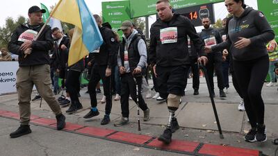 Amputee veterans of the Russian-Ukrainian war take part in a symbolic start to the running festival, the Kyiv Marathon of Invincibility. AFP