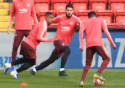Barcelona's Uruguayan striker Luis Suarez attends a training session at Anfield stadium in Liverpool on the eve of their UEFA Champions League semi-final. AFP