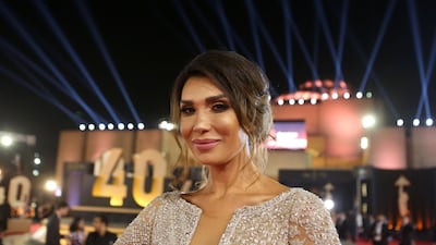 Tunisian actress Manel Hamrouni poses on the red carpet at the closing ceremony of the 40th edition of the Cairo International Film Festival. Photo / AFP