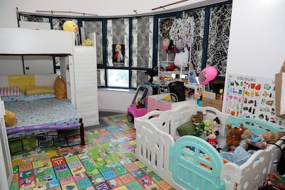 Nick Aquino lives with his sister's family in his apartment in Al Mankhool. Pawan Singh / The National