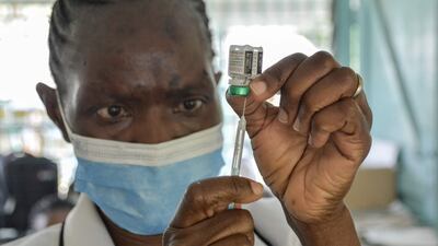 A health worker prepares a malaria vaccination for a child at a hospital in Kenya. Experts have welcomed the approval of the jab but said the threat of resistance remains. Brian Ongoro / AFP