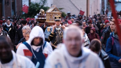 Religious dress is donned by some participants. Olivier Hoslet / EPA