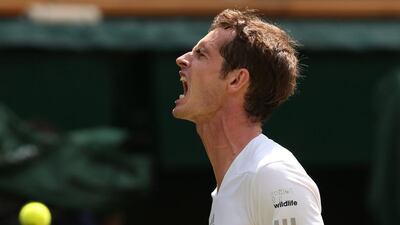 Andy Murray reacts to breaking the serve of Bulgaria's Grigor Dimitrov during their men's singles quarter-final match. It was Dimitrov who would have something to shot about later as he upset the defending champion on Day 9 of the 2014 Wimbledon Championships. Andrew Yates / AFP