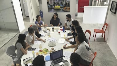 The Campus Art Dubai 5.0 reading group in discussion at the Project Space Art Jameel at Alserkal Avenue. Courtesy Art Jameel