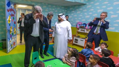 Dr Ryan and Mr Brennan meet children and staff during their visit