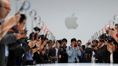 A demonstration of the newly released Apple products is seen following the product launch event. Reuters