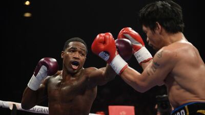 Manny Pacquiao and Adrien Broner box. Reuters