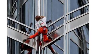 Alain Robert, who scaled the Burj Khalifa in 2011, has a challenge for the UAE's Saaed Al Memari. Kamran Jebrell / AP
