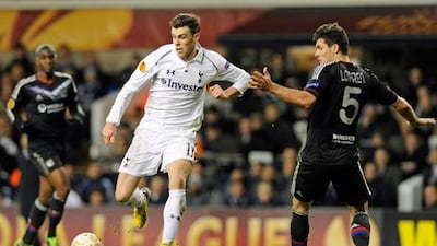 Tottenham winger Gareth Bale looks for a way through the Lyon defence.
