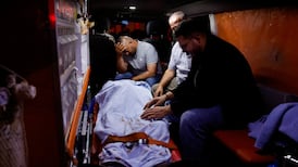 An ambulance carries the body of a Palestinian killed in violence near the village of Tell, in the occupied West Bank. Reuters