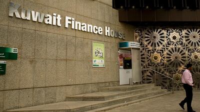 KFH suspended the acquisition of Bahrain’s Ahli United until December. Andrew Henderson / The National