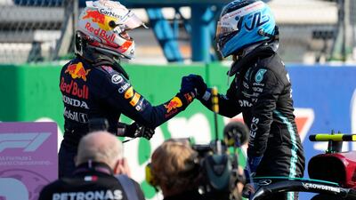 Mercedes driver Valtteri Bottas, right, with Red Bull driver Max Verstappen after the Sprint Race qualifying session at Monza. AP
