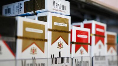 Packs of Marlboro cigarettes are displayed for sale at a shop in Somerville, Massachusetts. Shares of Altria, which sells the Marlboro brand in the US, slumped 6.2 per cent in New York trading after reports that the Biden administration will curb nicotine levels to make cigarettes less addictive. Reuters