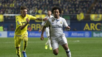 Real Madrid defender Marcelo, right, escapes from Villarreal midfielder Samu Castillejo. Domenech Castello / EPA