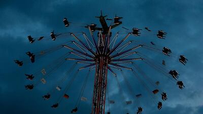 Visitors ride a merry-go-round during the opening day of the 182nd Oktoberfest in Munich, Germany. Millions from around the world will come to the Bavarian capital over the next two weeks for Oktoberfest, which starts today and runs until October 4. Michael Dalder / Reuters
