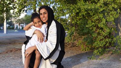 Hamda Al Hadhrami with her 3-year-old daughter, Ruwaida, in Abu Dhabi. Christopher Pike / The National