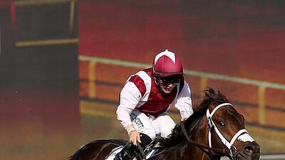 Dubai, United Arab Emirates-March,26, 2016: Jockey Sam Hitchcott riding One Man Band wins the Race2 Meydan Sobha during the Dubai World Cup at the Meydan Racecourse in Dubai. ( Satish Kumar / The National ) ID No: 53060Section: Sports