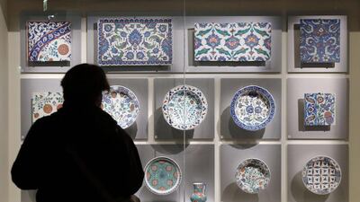 A ceramic Iznik pottery plates and tiles from the Ottoman Empire period displayed at the Louvre Museum in Paris before it is transferred to the Louvre in Abu Dhabi on April 28. Francois Guillot/AFP