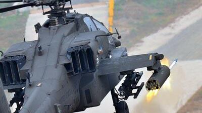 A US Apache helicopter in a gunnery exercise.