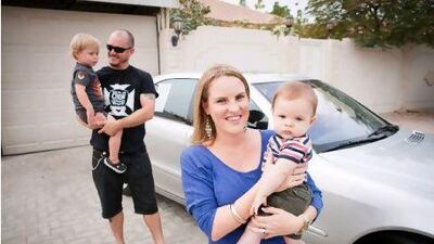 One of them has to stay behind: Naomi and Ben Munro with their children Jack and Tyson and their loyal but unnamed family servant, at rear. Callaghan Walsh for The National