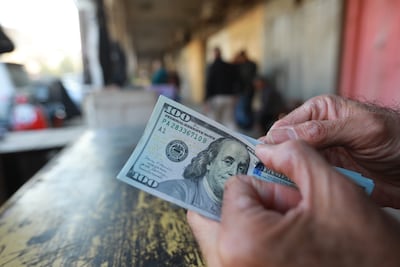 Dozens of private banks in Iraq are still prohibited from dealing in US dollars. Getty Images
