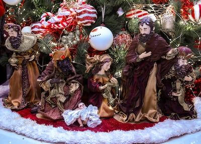 A sculpted scene from the Nativity story under the Christmas tree in the Bracho residence. Victor Besa / The National