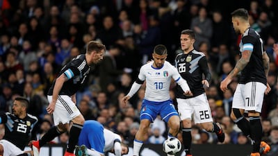Lorenzo Insigne, centre, is among a group of players that can help Italy play a more progressive brand of football in the future. Phil Noble / Reuters