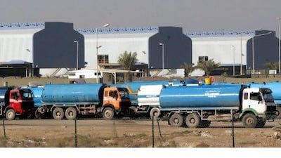 Tankers queue to fill up with fresh water distilled from sea in Dubai. Desalination and airconditioning are major consumers of energy in the UAE.Kamran Jebreili / AP Photo