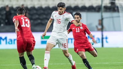 Yemen, in red, faced Iran in their first ever Asian Cup match at Mohammed bin Zayed Stadium in Abu Dhabi on Monday night.