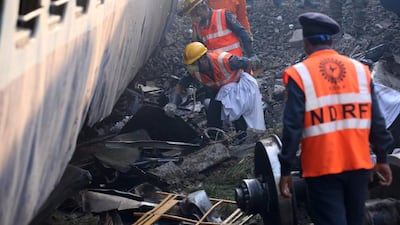 Members of the Indian National Disaster Response Force (NDRF) work at the site of an accident where coaches of an Indore-Patna Express train derailed near Pukhrayan area, in Kanpur, India, on November 21, 2016. According to reports, at least 120 people were killed and more than 100 were injured after 14 coaches of an Indore-Patna Express train derailed in the early morning hours on 20 November. Rajat Gupta / EPA