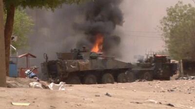 A still image taken from a video shows an armoured personnel carrier on fire after a car bomb attack in Gao, northern Mali. REUTERS/via Reuters TV