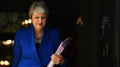 Prime Minister Theresa May leaves 10 Downing Street for her final PMQ's on July 24, 2019 in London, England. Getty Images