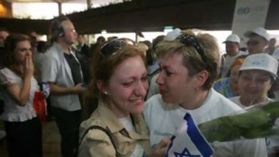 A Russian immigrant to Israel is greeted by well-wishers as she arrives at Israel's Ben Gurion airport last year.