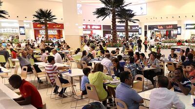 A reader says walking around the food court in a mall is better than shopping. Pawan Singh / The National