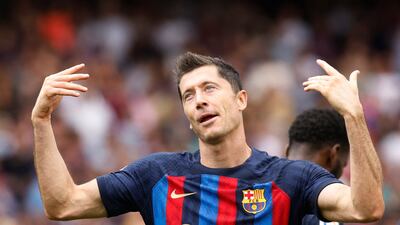 Lewandowski celebrates scoring the first goal. Reuters