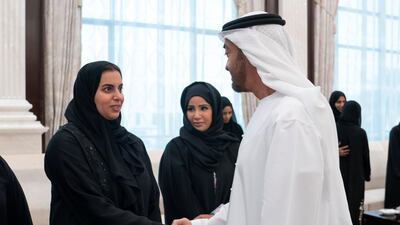 Sheikh Mohamed bin Zayed, Crown Prince of Abu Dhabi and Deputy Supreme Commander of the UAE Armed Forces (right), greets a member of the Ministry of Presidential Affairs, during an iftar reception, at Abu Dhabi's Al Bateen Palace. All photos by the Ministry of Presidential Affairs
