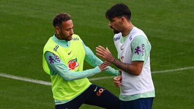 Brazil's Neymar with Lucas Paqueta during training. AFP