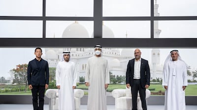 Sheikh Mohamed bin Zayed, Crown Prince of Abu Dhabi and Deputy Supreme Commander of the Armed Forces (C), stands for a photograph after a lecture at Majlis Mohamed bin Zayed alongside, from right, Dr Saeed Al Dhaheri, director of the Centre for Futures Studies at the University of Dubai; Salim Ismail, founding executive director of Singularity University; Khalifa Al Qama, head of labs at the Dubai Future Foundation; and Peng Xiao, chief executive of G42. All photos: Ministry of Presidential Affairs