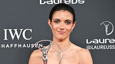 Spanish footballer Aitana Bonmati poses with her Laureus World Sportswoman of the Year award. AFP