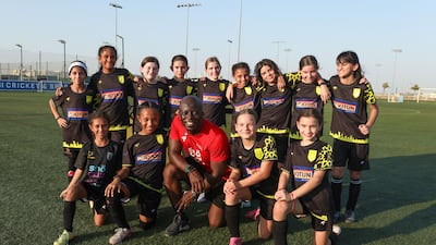 Seth Amoafo, founder of Pass academy at the Abu Dhabi Cricket Academy football area with his students. All photos: Victor Besa / The National