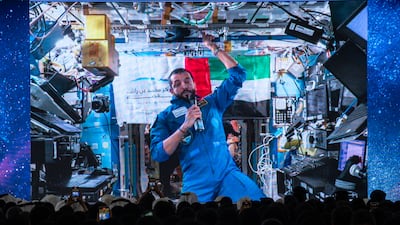 Dr Al Neyadi speaks with students at UAE University in Al Ain during a live call from the ISS. Ryan Lim for The National