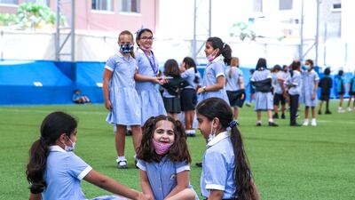 In-person lessons are not the only change, as this happy group enjoying a break from classes shows.