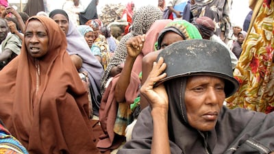 July 25 2011: Somalis displaced by famine wait to receive rations at a displaced camp in Mogadishu, Somalia. Mohamed Sheikh Nor / AP Photo