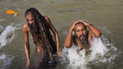 Hindus believe that sins accumulated in past and current lives require them to continue the cycle of death and rebirth until they are cleansed. Bathing in sacred waters on the most auspicious day of the Kumbh festival, believers say rids them of their sins. Bernat Armangue / AP