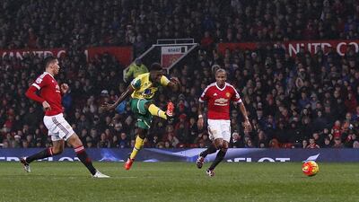 Alexander Tettey of Norwich City shoots and scores their second goal against Manchester United on Saturday at Old Trafford. Andrew Yates / Reuters