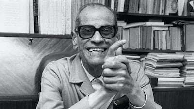Naguib Mahfouz by his desk in Cairo in 1988. AFP